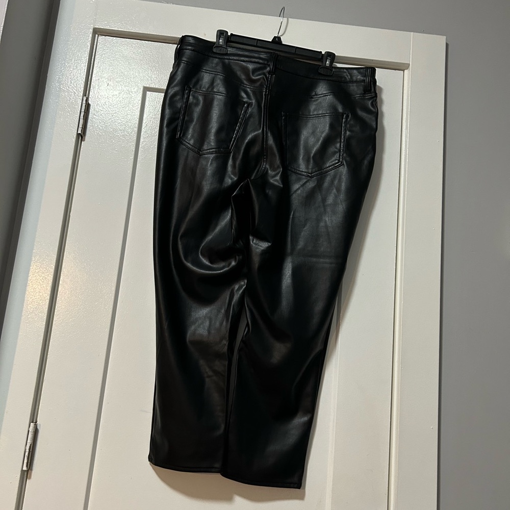 Women black faux leather pants.